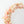Detail van hangende flowerhoop met droogbloemen in roze en crème kleuren op een zwarte metalen ring van 30 cm